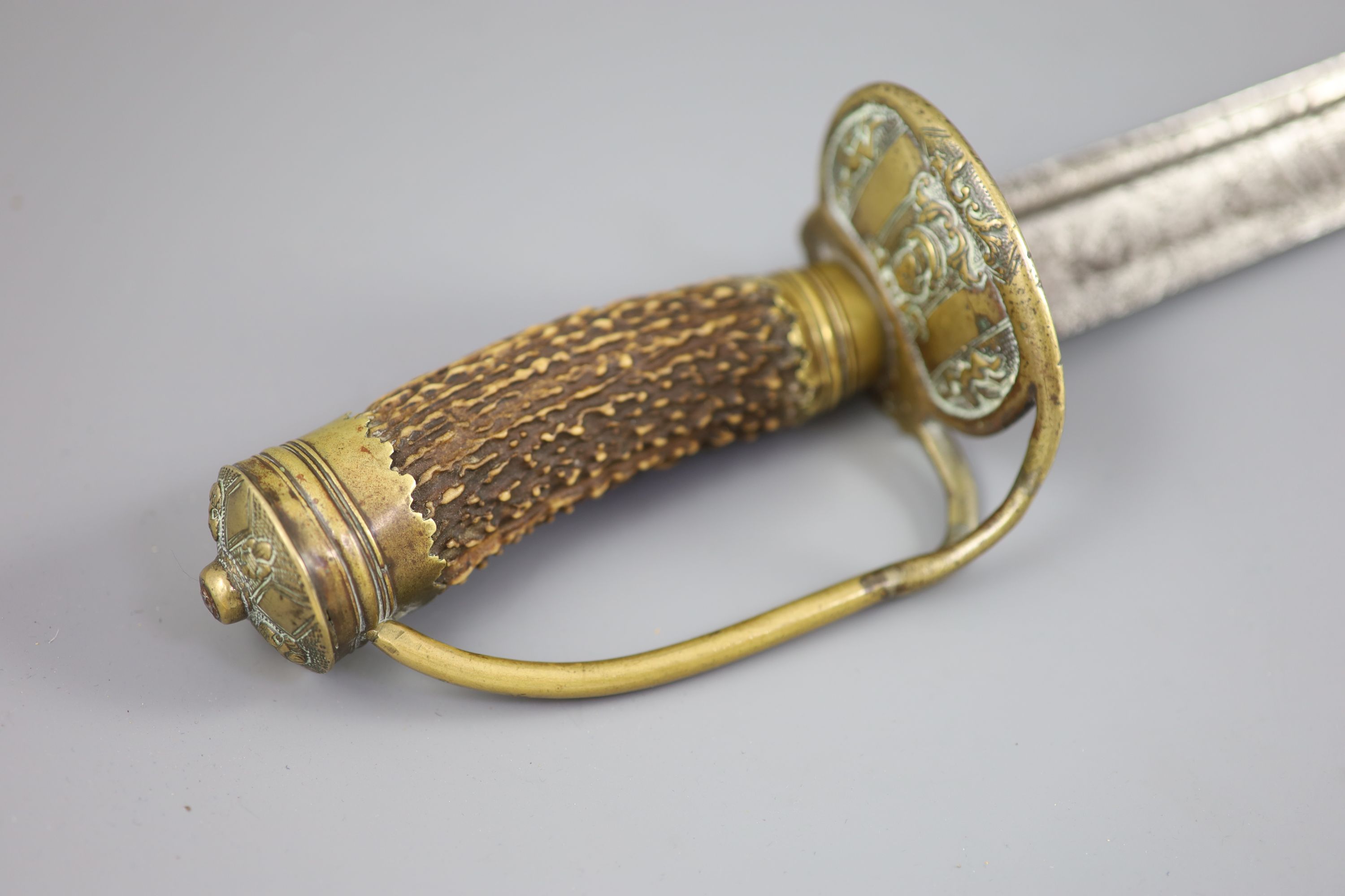 A late 17th century military hangar sword, length 34in.